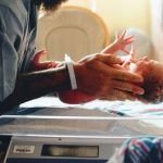 What is premature birth? Baby feet in an open incubator